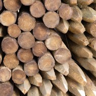 Bundles of 10ft imported pine wooden posts